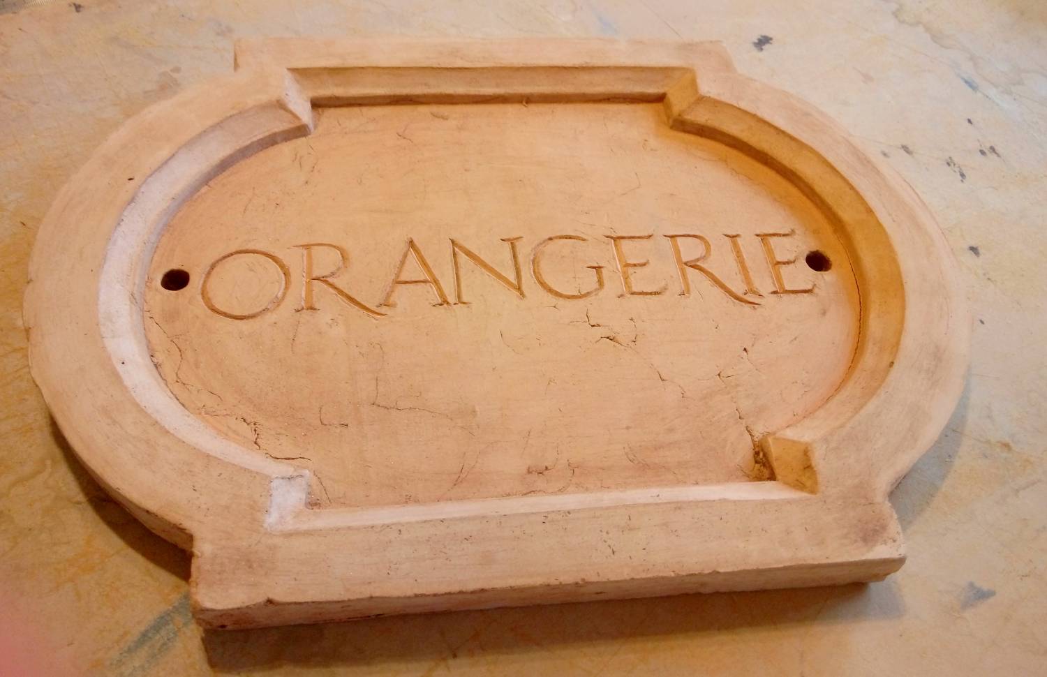 Plaque en terre cuite